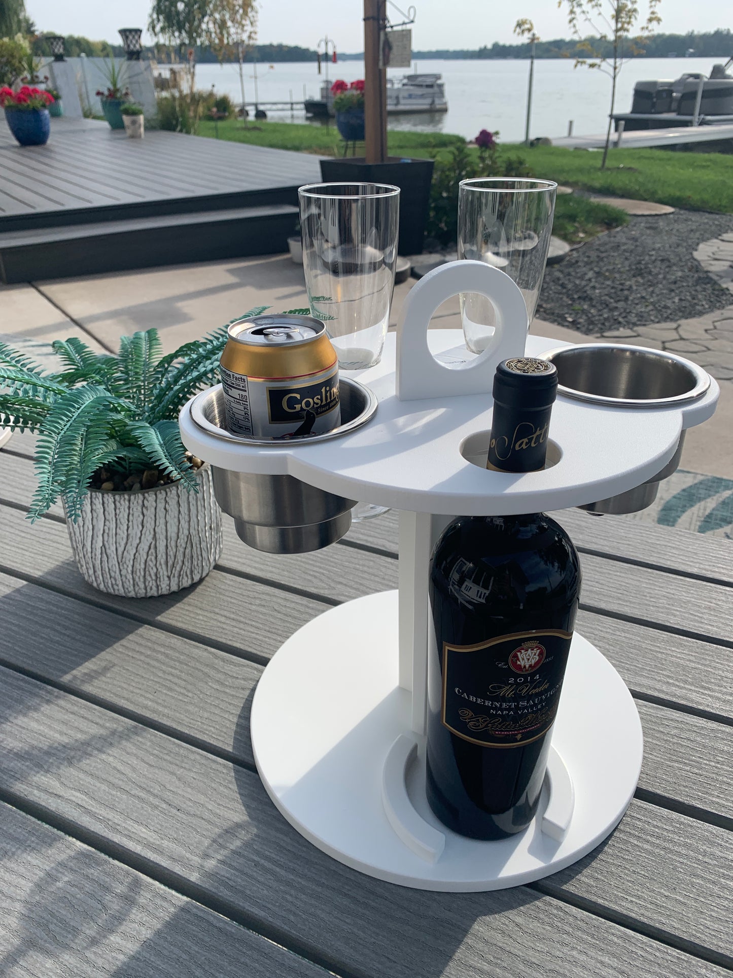 White Table Top Cup and Wine glass holder placed outdoors with Wine bottle