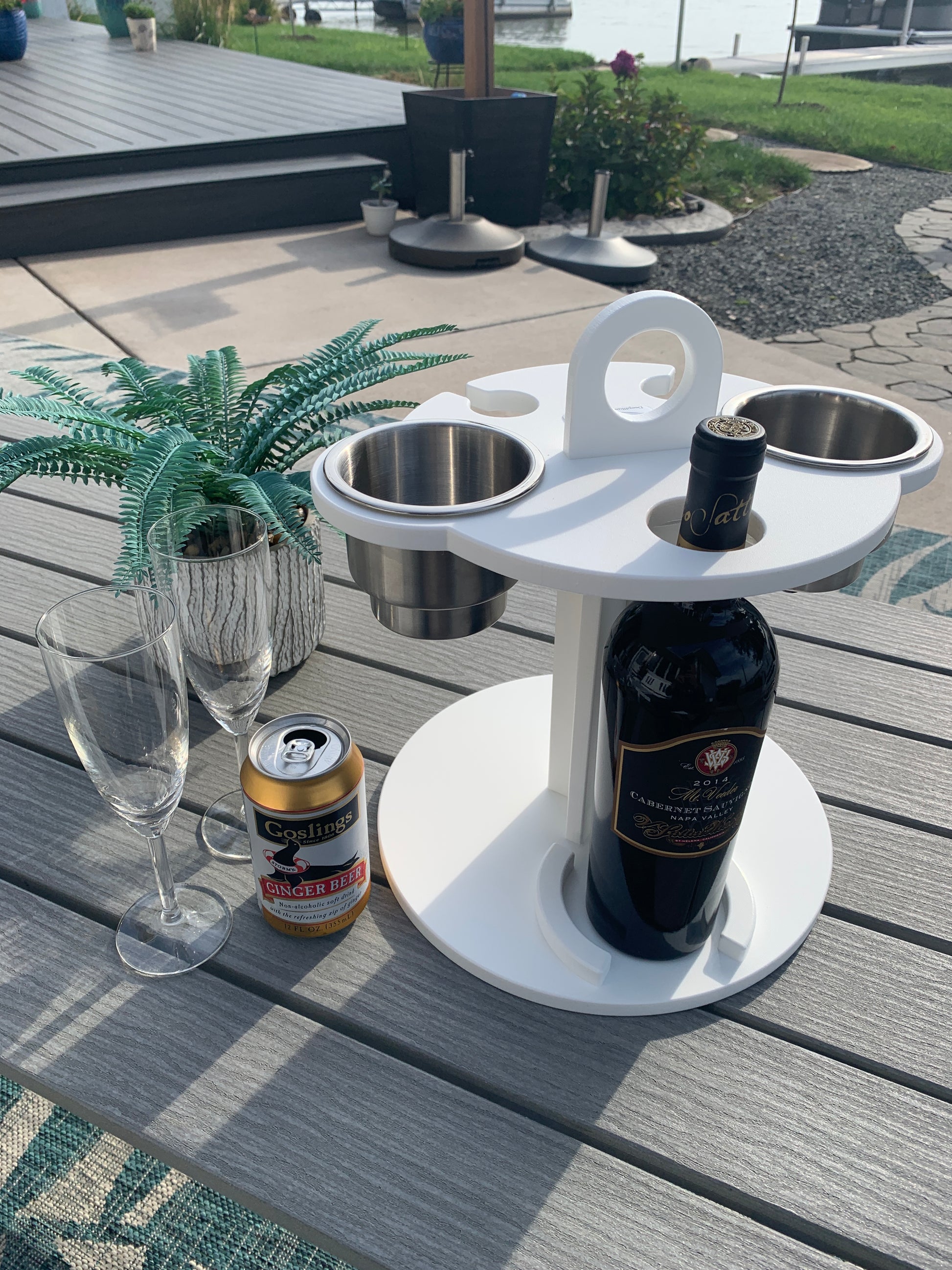 White Table Top Cup and Wine glass holder placed outdoors